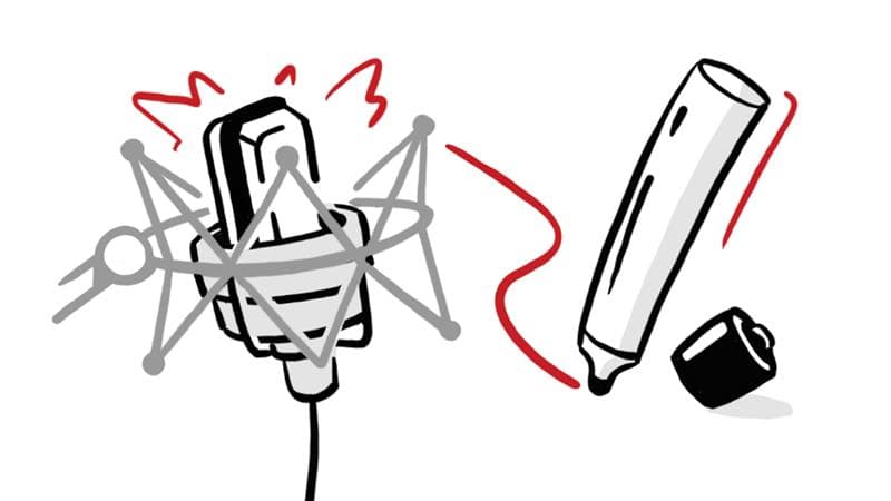 A studio microphone and a marker with its cap off, symbolizing the narration and illustration elements that shape effective whiteboard videos.