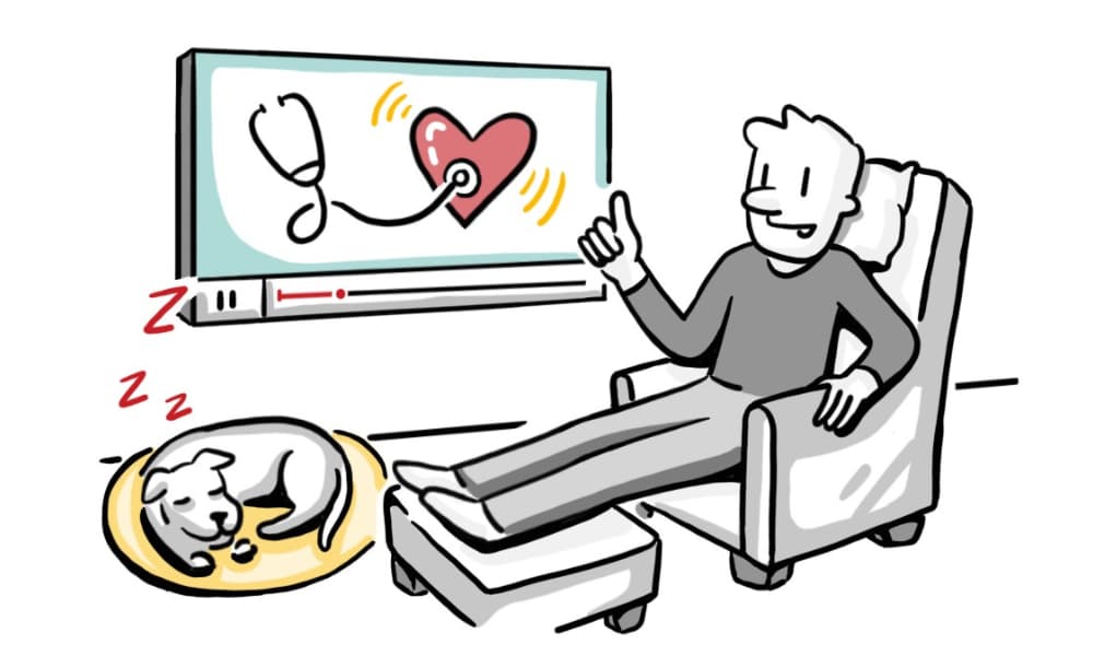 Relaxed patient watching a medical explainer video with heart and stethoscope visuals, showing how calm, empathetic storytelling reduces anxiety and supports understanding.